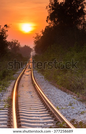 dramatic sunset over railroad, Kanchanaburi, Thailand