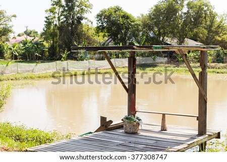 Waterfront pavilion; farmer take a rest after working in a plantation,Thai folk life
