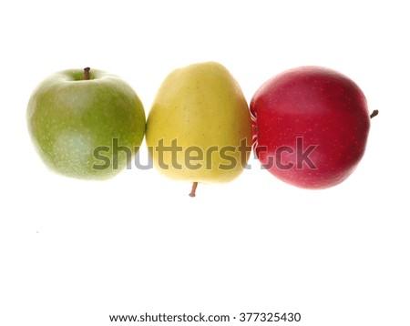 red, green and yellow apples on a white background