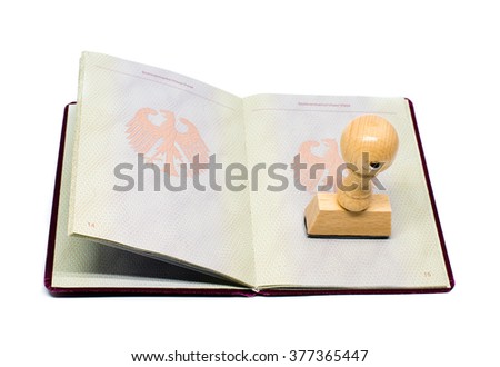  Immigration approved -German passport with stamp and shadow on a perfect white background