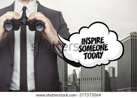 Inspire someone today text on speech bubble with businessman holding binoculars