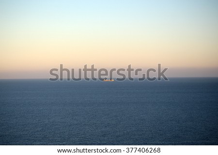 Peaceful offing and ship offshore zone seacoast coastal waters of beautiful blue sea horizon on wonderful weather day time on clear sky background, horizontal picture 