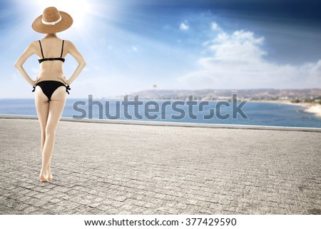summer terrace of woman in hat 