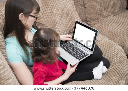 Watching cartoons on laptop