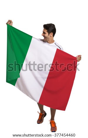 Fan holding the flag of Italy celebrates on white background.
