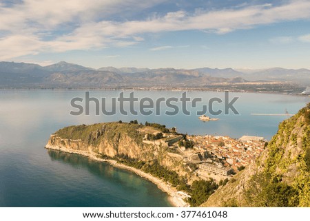 Top view of of Nafplio in Greece with castle Bourtzi and the old city.