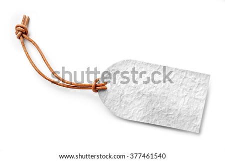 white cardboard label with thin leather cord, isolated
