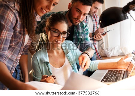 Group of young business people and designers.They working on new project.Startup concept. Royalty-Free Stock Photo #377532766
