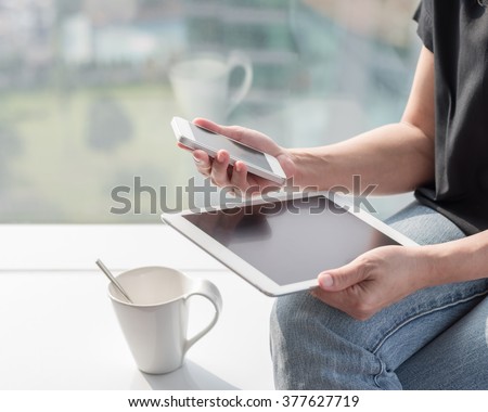 Digital lifestyle blog writer or business person using smart device working on internet communication technology 