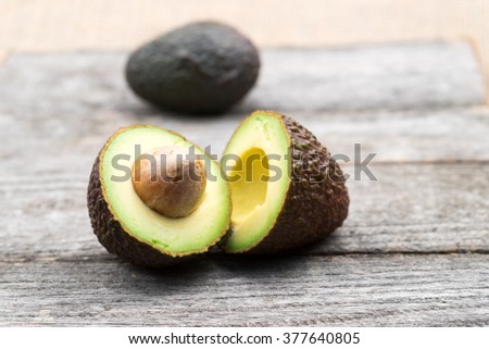 Ready to eat avocado on a wooden surface