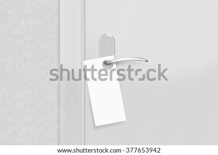 Door knob with blank flyer mock up. Empty white flier mockup hang on doors handle. Leaflet design on entrance doorknob. Pizza coupon on the knob. Clear paper hanging near grey wall. 