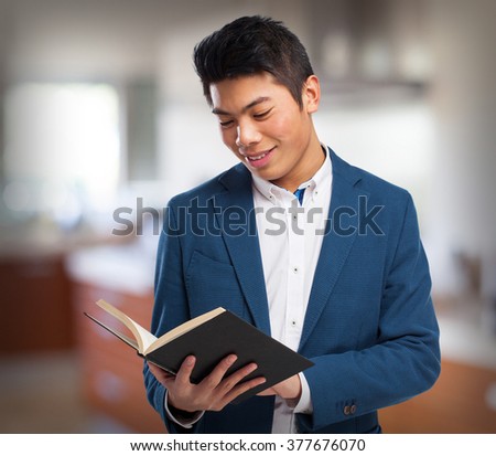 chinese man with book
