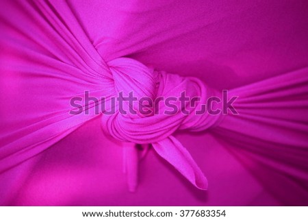 abstract background cloth or liquid wave or wavy folds of grunge silk texture material or luxurious