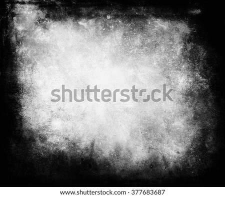 Black And White Grunge Abstract Background With Faded Central Area For Your Text Or Picture