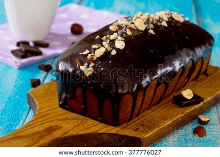 Homemade chocolate cupcake with icing, selective focus.