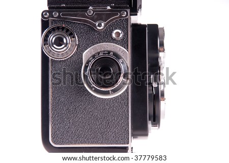 Antique medium format film mechanical camera isolated on white