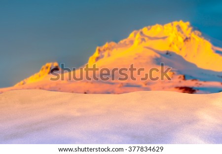 empty snow floor foreground with snow mountain background,Ready for product display montage.
