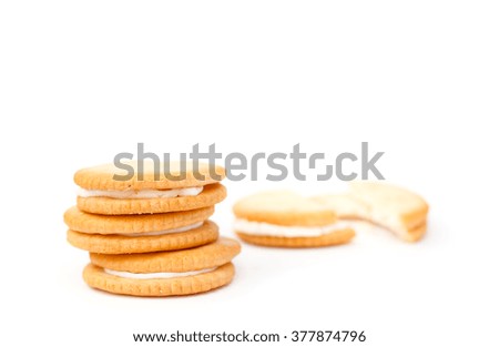 A stack of delicious wheat round biscuits with cream
