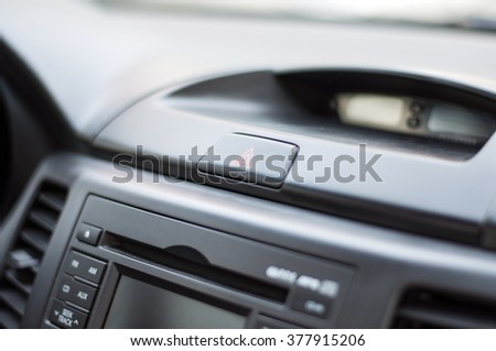 Closeup  emergency stop button in car