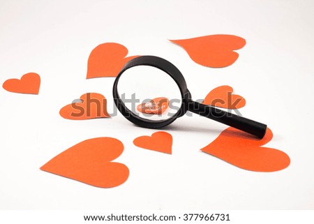 Heart under magnifying glass