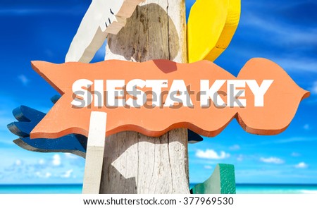 Siesta Key welcome sign with beach