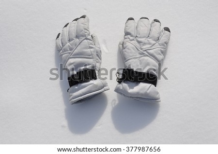 White gloves in snow 