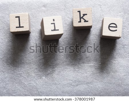 LIKE word made of wooden letters