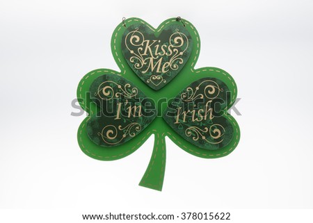 A kiss me I'm Irish sign against a white background