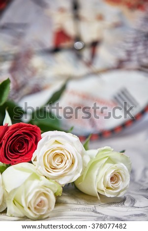 a bouquet of white and red roses
blank for cards