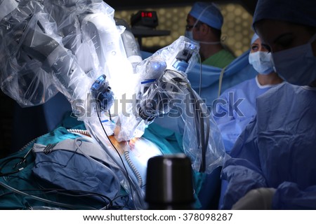 Surgical operation robot. Robotic Surgery. Medical operation involving robot. Da Vinci Surgery. Minimally Invasive Robotic Surgery with the da Vinci Surgical System. Royalty-Free Stock Photo #378098287