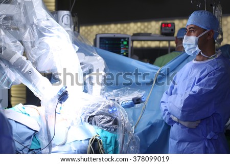 Surgical operation robot. Medical operation involving robot. Robotic Surgery. Manipulators performing surgery on humans. Royalty-Free Stock Photo #378099019