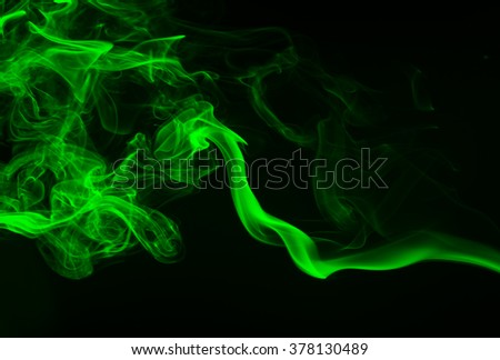 Green smoke abstract on dark background