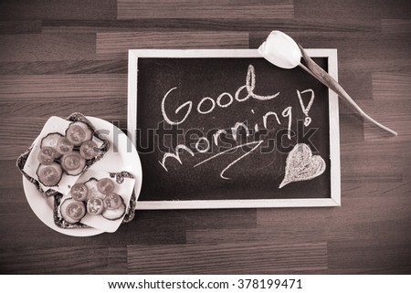Delicious sandwich, white rose and a blackboard with written text: "Good morning!" Image includes a effect.