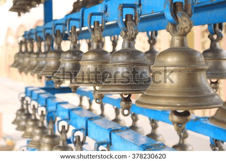 Hindu temple bells. Bells of the old temple in India. Pattern of bells. Background.