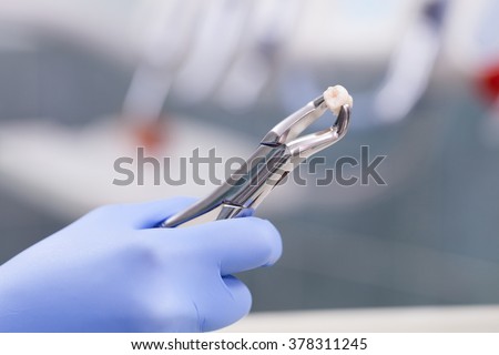 Dental instrunemt for tooth extraction Royalty-Free Stock Photo #378311245