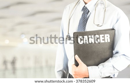 doctor with stethoscope document file word cancer on bokeh background