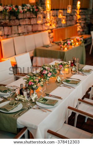 Wedding table in a rustic style with olives