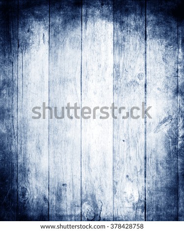 Blue wood texture background with faded central area for your text or picture, retro wooden background