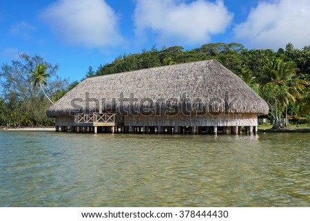 The Fare Potee built on stilts over the water on the shore of the lake Fauna Nui, Maeva, Huahine island, French Polynesia