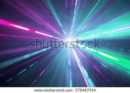 Abstract background with lights burst. Laser lights and fog. Party lights