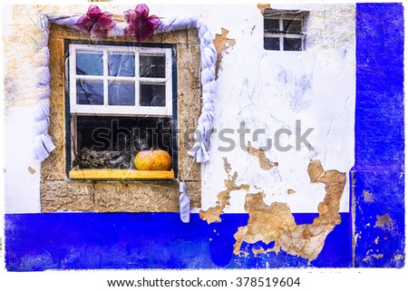 colorful streets of old town Obidos in Portugal, artistic picture