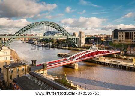 Tyne and Swing Bridges from above / The iconic bridges over the River Tyne between Newcastle and Gateshead have become famous and attract many visitors to the quayside Royalty-Free Stock Photo #378535753