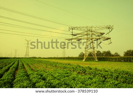 electric tower in the fields, closeup of photo
