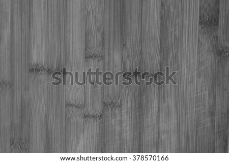 Old grunge wooden cutting kitchen desk board on black and white