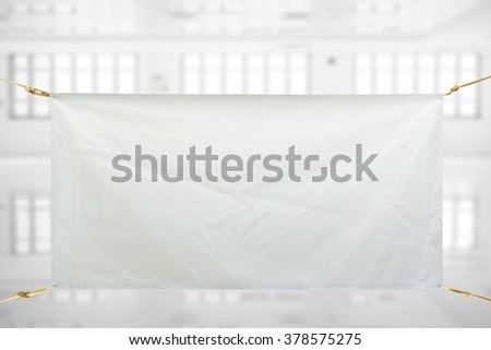Copy space for text on white vinyl banner on white storehouse
 background .Clipping path