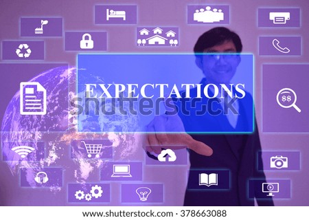 expectations concept  presented by  businessman touching on  virtual  screen ,image element furnished by NASA