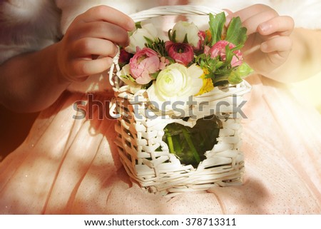 Flower girl holding flower