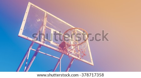Basketball hoop on a blue sky , vintage tone