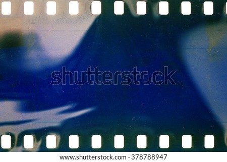 Blank crumpled noisy blue  film strip texture background