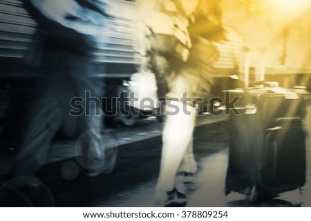 Abstract blurred background of couple travelers walking in the train station